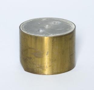 brass-plated counterweight with mounting holes