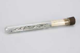 antimony-potassium alloy samples in stoppered glass tube