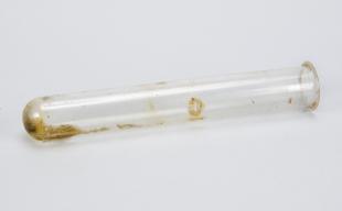 empty glass test tube with residue
