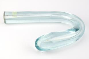 bent green glass U-shaped tube
