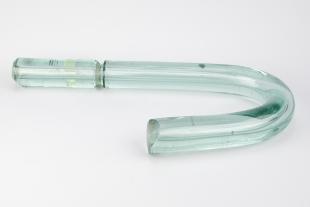 bent green glass U-shaped tube