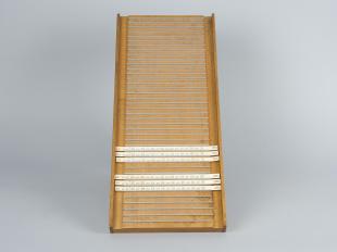wooden tray used in Beevers-Lipson calculations