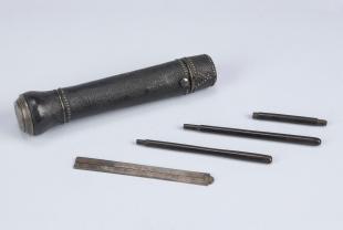 Baradelle-type cylindrical etui of silver drawing instruments with inkwell