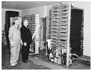 IBM ASCC-Mark I photo album: Piatt(right), Kemble looking at storage counters