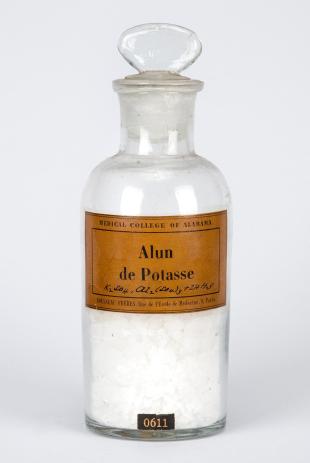 stoppered glass bottle of "Alun de Potasse"