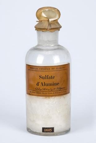 stoppered glass bottle of "Sulfate d'Alumine"