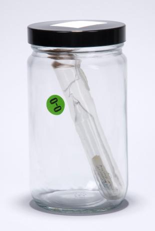 black phosphorus sample in stoppered glass tube inside glass jar