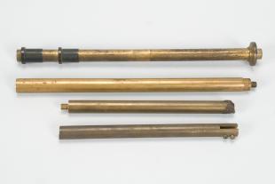 assorted upright supporting columns from instrument stands