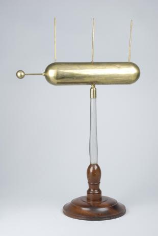 brass electric conductor on glass stand, with ball and three vertical rods