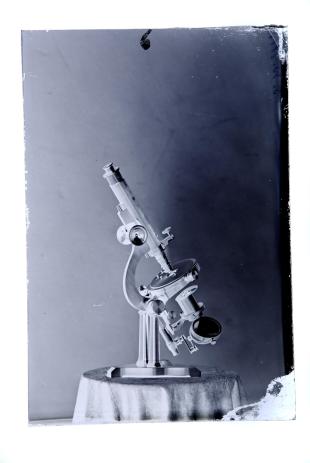 three glass plate negatives of 2 Tolles microscopes and 1 telescope