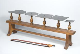bench with 6 Chladni plates and vioin bow